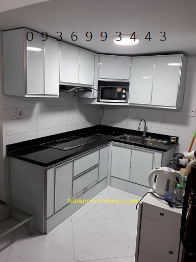 mẫu thi công tủ bếp nhôm cánh hệ Zang Lee mặt kính 6 ly 38 trắng sữa đã xây bệ bếp mẫu thi công tủ bếp nhôm cánh hệ Zang Lee mặt kính 6 ly 38 trắng sữa đã xây bệ bếp