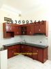 tủ bếp nhôm vân gỗ chữ L - anh 1