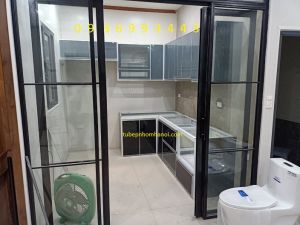 tủ bếp nhôm chữ L cánh hệ Zang Lee mặt Acrylic